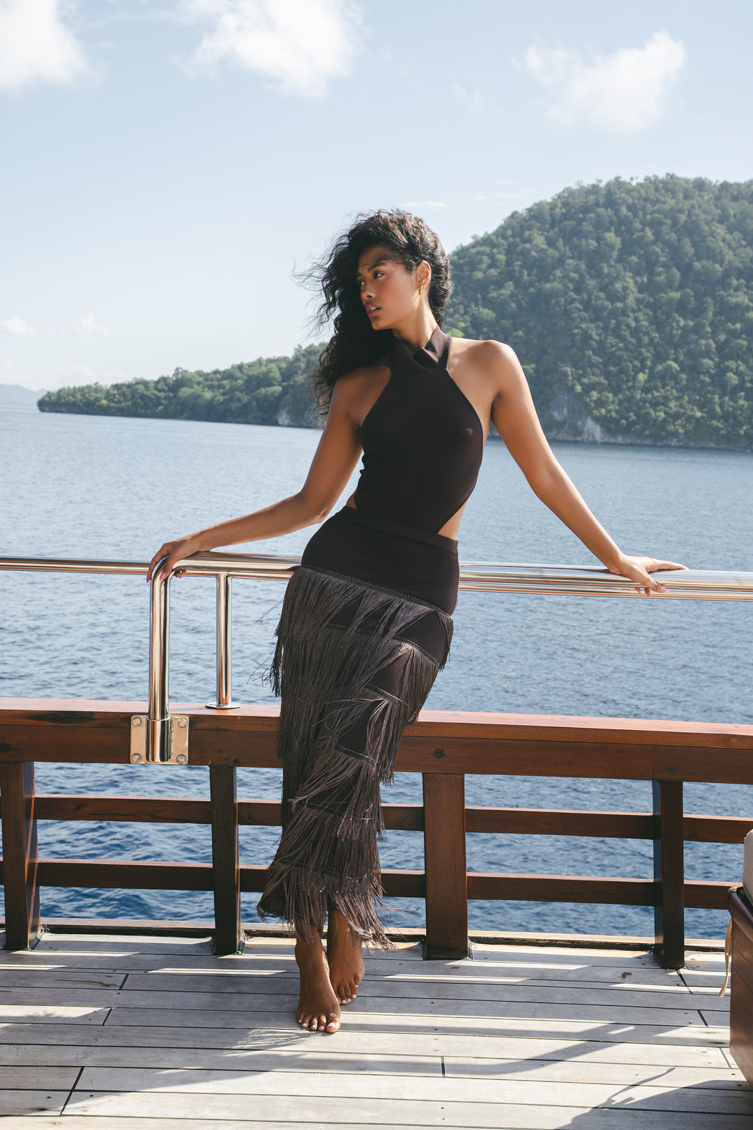 Seen Studios halter fringe maxi dress moving in the wind