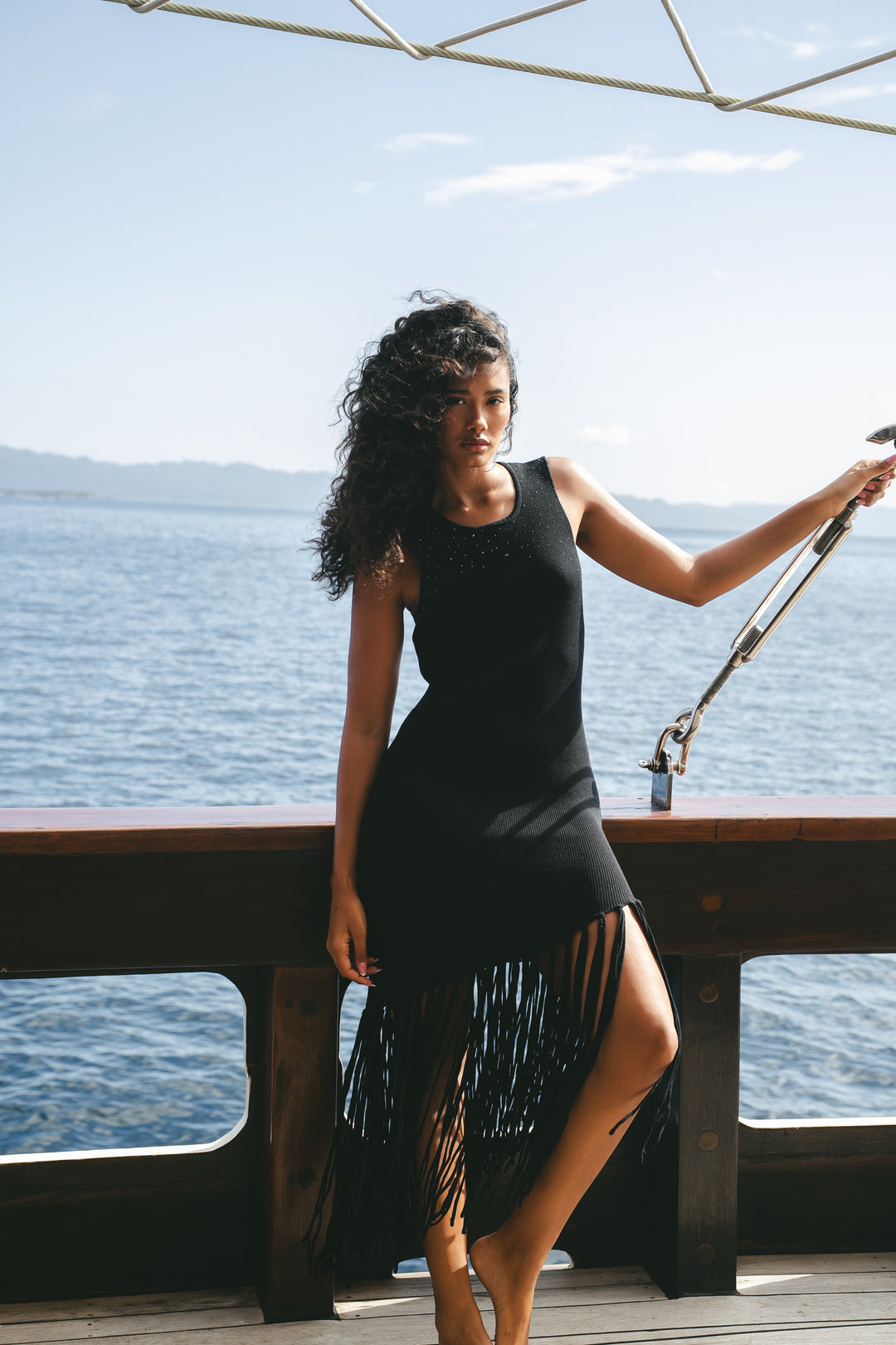 Seen Studios open back fringe dress in a coastal setting